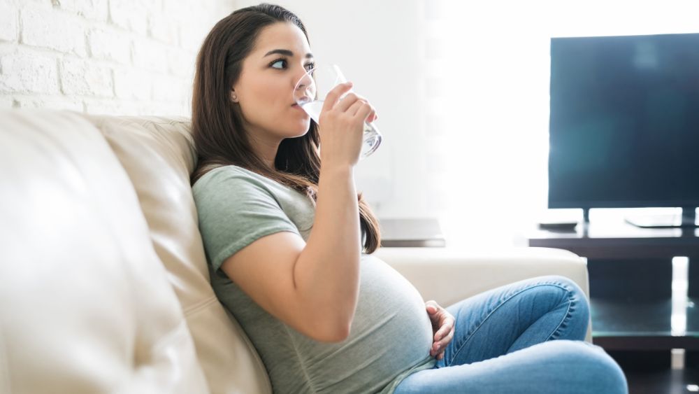 Pregnant Woman Drinking Water - NRKSS Blog